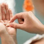 Person taking creatine gummies post-workout to maximize absorption